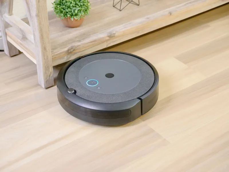 Robot vacuum cleaner on a wooden floor